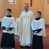 St. James Catholic School Photo #2 - Rev. Msgr. Volk welcomes our new altar servers.