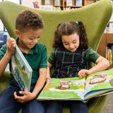 St. Theresa School Photo #2 - Students in Preschool through 4th grade visit weekly for read aloud story-time, and library lessons including book genres, authors and choosing a "just right book."