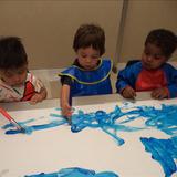 Bensenville KinderCare Photo #10 - Our toddlers working on their fine motor skills using paintbrushes.